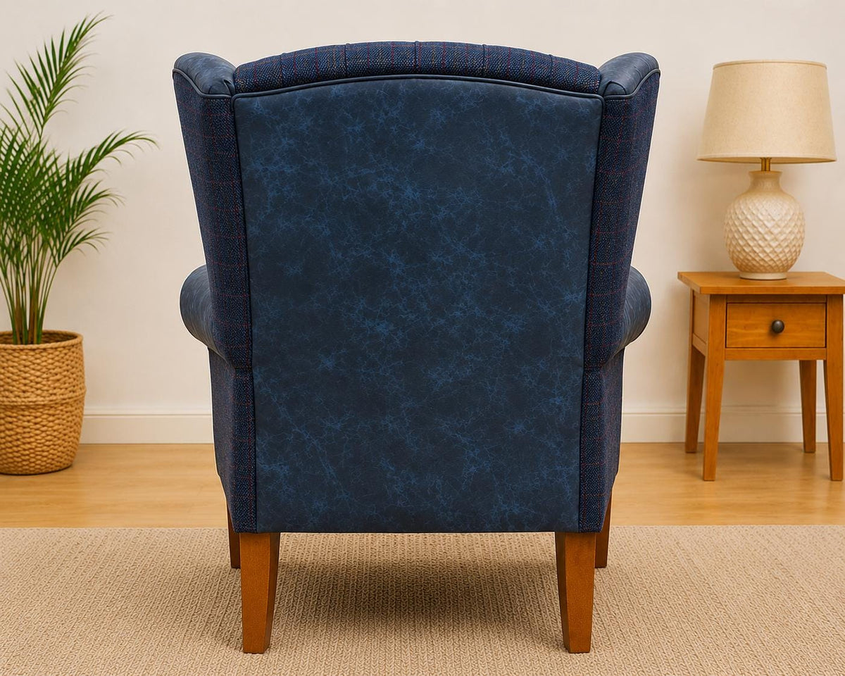 Full rear view of blue Italian leather and Royal Harris Tweed wingback chair