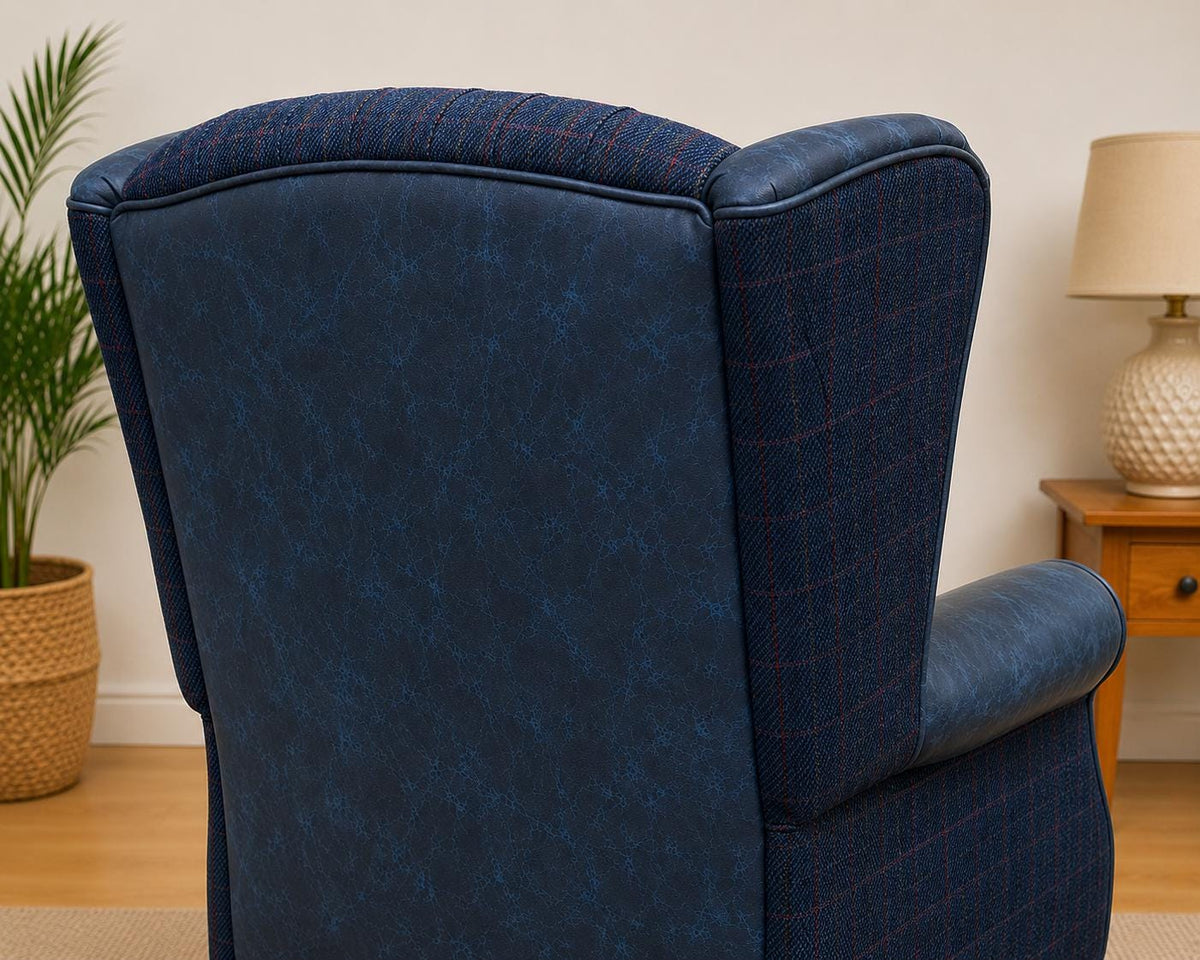 Rear detail of blue Italian leather and Royal Harris Tweed wingback chair