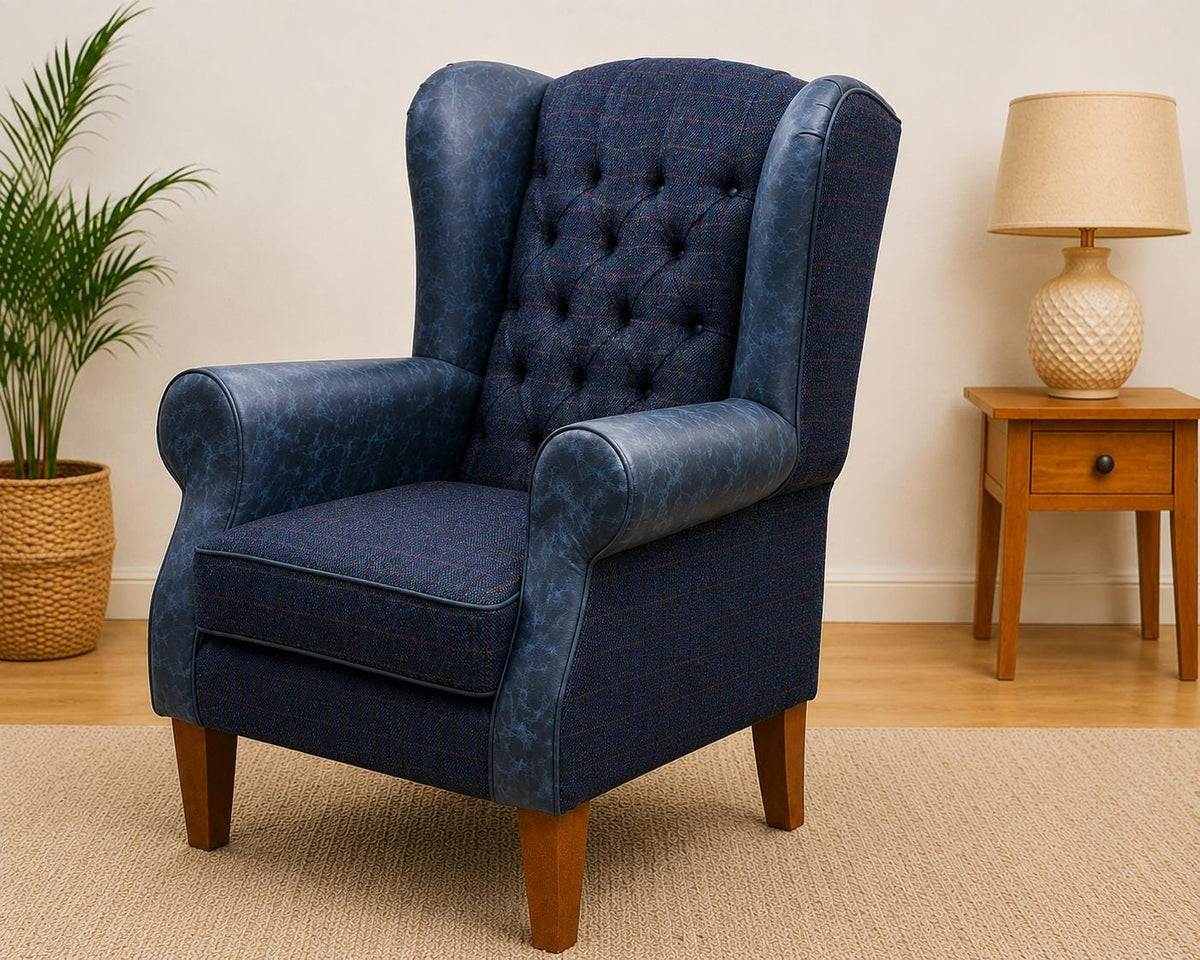 Blue Italian leather and Royal Harris Tweed wingback chair in a styled room