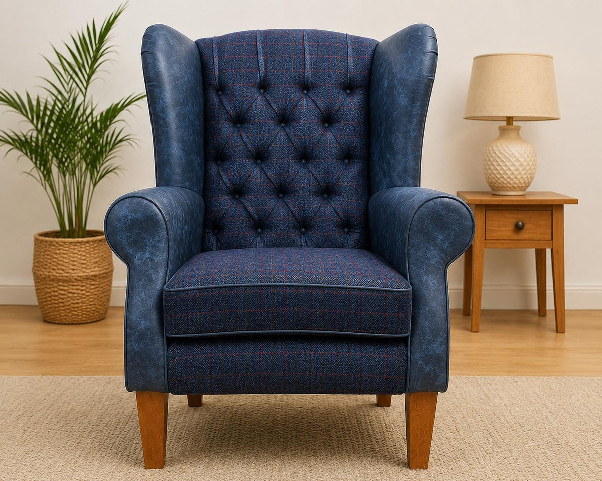 Front view of blue Italian leather and Royal Harris Tweed buttoned wingback chair